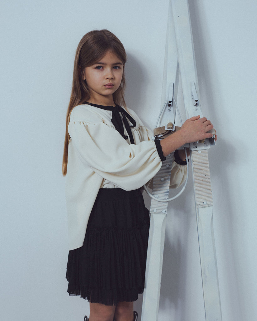 UNLABEL FW23 Curious Bow Blouse in Vanilla and Black
