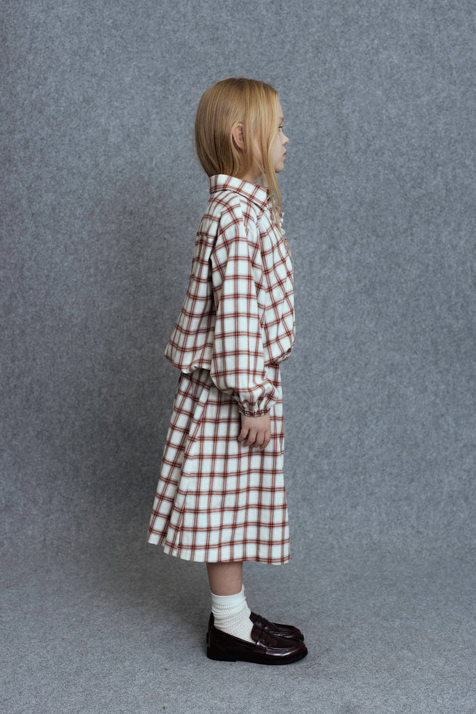 UNLABEL FW25 Kosi Pleated Skirt in Cream and Red Check