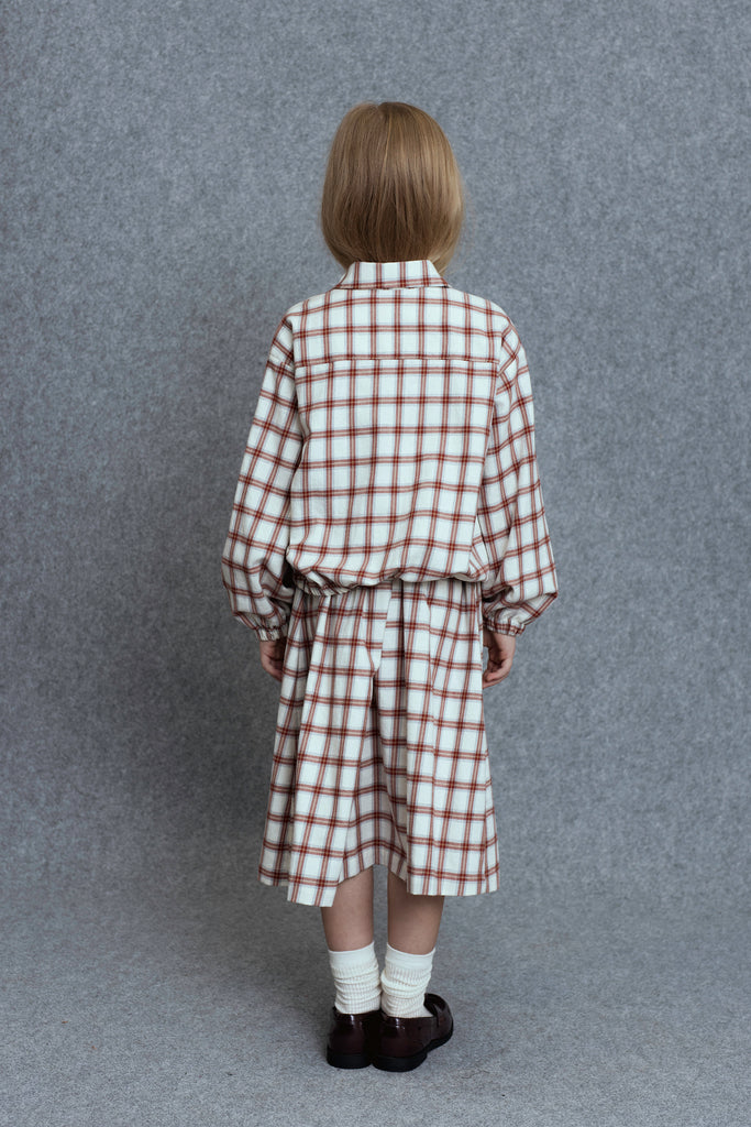 UNLABEL FW25 Kosi Pleated Skirt in Cream and Red Check