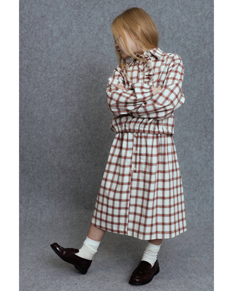 UNLABEL FW25 Kosi Pleated Skirt in Cream and Red Check