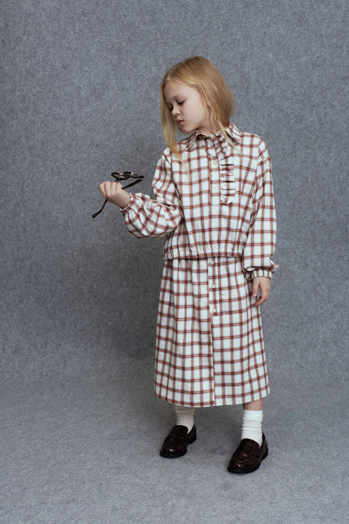 UNLABEL FW25 Kosi Pleated Skirt in Cream and Red Check