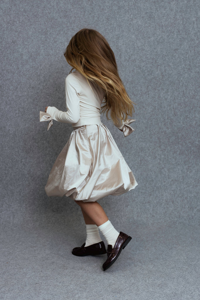 UNLABEL FW25 Agrio Long Sleeve Top with Bow Sleeve Details in Cream *PREORDER*